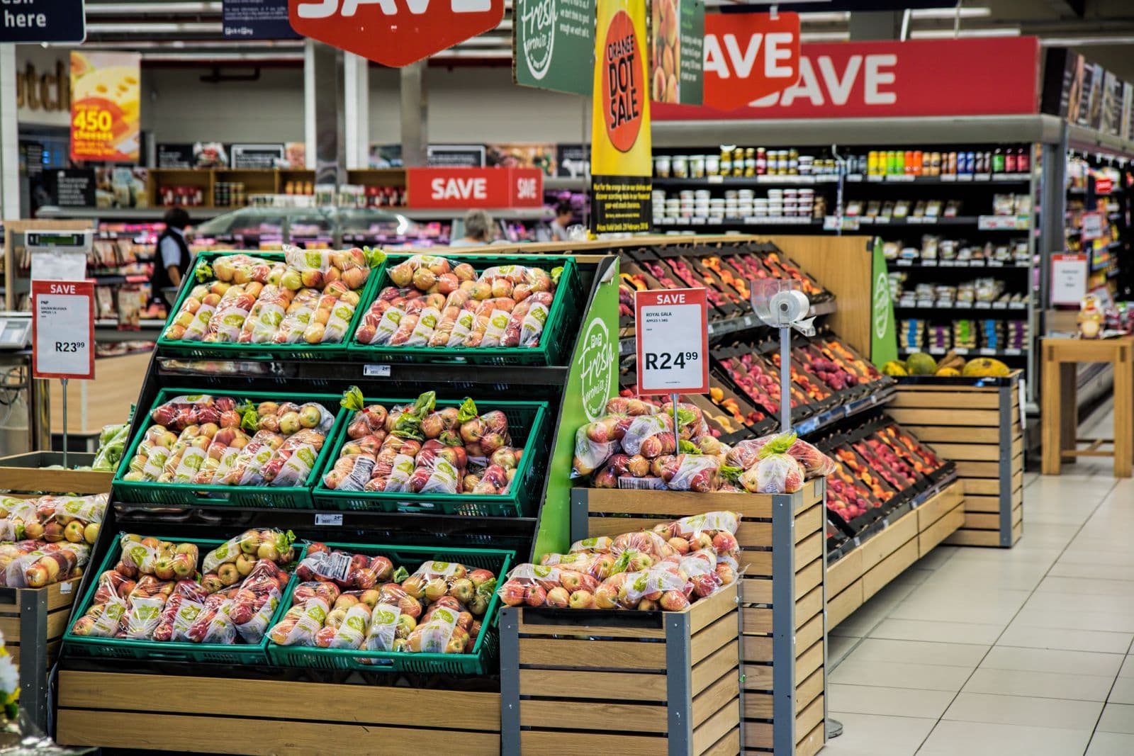 Independent retail shop with neatly arranged merchandise and a checkout counter